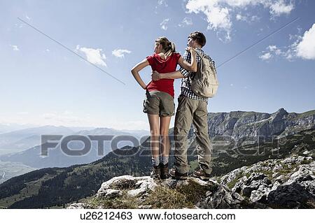 Couple admiring rural landscape View Large Photo Image Stock Image - Couple admiring rural landscape. Fotosearch