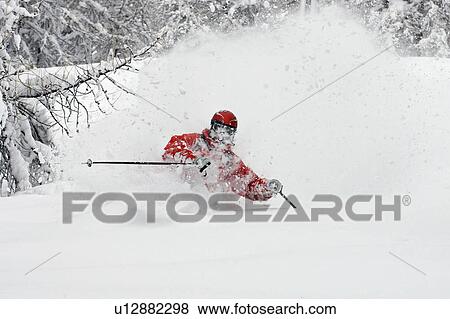 Cross country skier on snowy terrain View Large Photo Image Stock Photo - Cross country skier on snowy terrain. Fotosearch