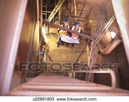 Engineers inspecting ship View Large Photo Image Stock Image - Engineers inspecting ship. Fotosearch