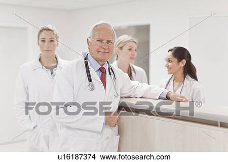 Picture - Group of doctors in hospital. Fotosearch