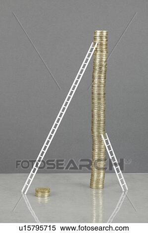 Stock Photography - Ladders leaning on stack of coins. Fotosearch