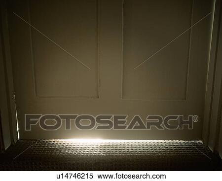 Light glowing from under door View Large Photo Image Stock Photography - Light glowing from under door. Fotosearch