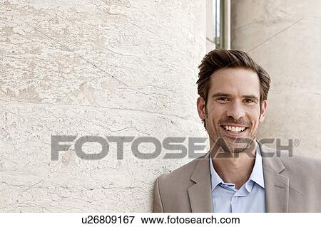 Man smiling outdoors View Large Photo Image Stock Photo - Man smiling outdoors. Fotosearch