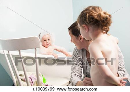 Mother bathing children View Large Photo Image Stock Photo - Mother bathing children. Fotosearch