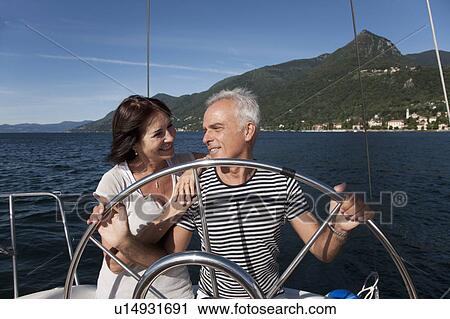 Older couple sailing together View Large Photo Image Stock Image - Older couple sailing together. Fotosearch