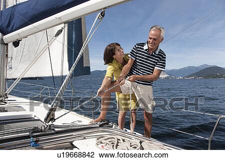 Older couple sailing together View Large Photo Image Stock Image - Older couple sailing together. Fotosearch