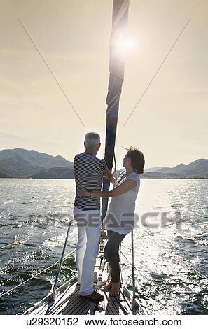 Older couple sailing together View Large Photo Image Stock Image - Older couple sailing together. Fotosearch