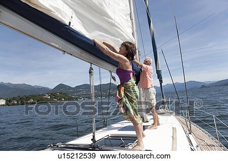Older couple sailing together View Large Photo Image Stock Photo - Older couple sailing together. Fotosearch