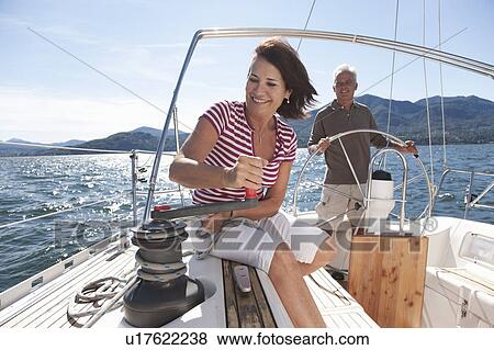 Older couple sailing together View Large Photo Image Stock Photo - Older couple sailing together. Fotosearch