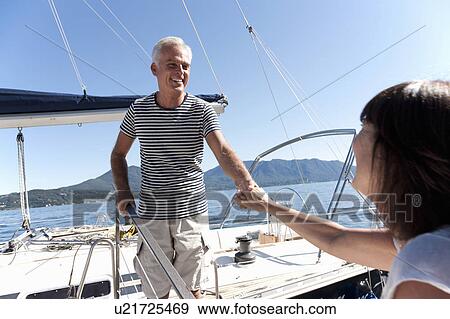 Older couple sailing together View Large Photo Image Stock Photo - Older couple sailing together. Fotosearch