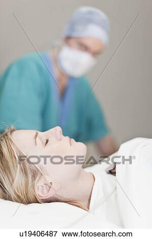 Patient unconscious in operating room View Large Photo Image Stock Photo - Patient unconscious in operating room. Fotosearch