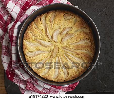 Pear and orange polenta cake View Large Photo Image Stock Image - Pear and orange polenta cake. Fotosearch