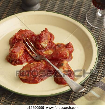 Plate of stuffed squid provencal View Large Photo Image Stock Photo - Plate of stuffed squid provencal. Fotosearch