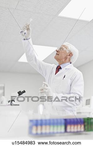 Scientist working in pathology lab View Large Photo Image Stock Image - Scientist working in pathology lab. Fotosearch