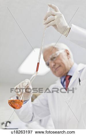 Scientist working in pathology lab View Large Photo Image Stock Photo - Scientist working in pathology lab. Fotosearch