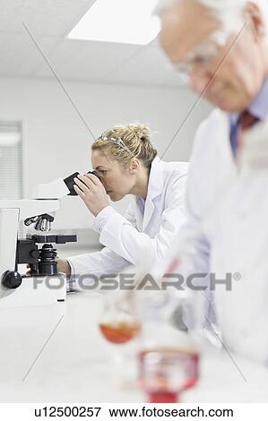 Stock Photo - Scientists working in pathology lab. Fotosearch