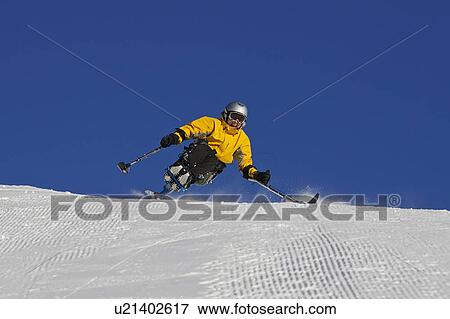 Skier on snowy mountain slope View Large Photo Image Stock Photo - Skier on snowy mountain slope. Fotosearch
