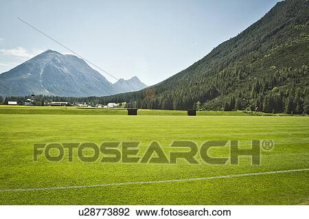Sports field in rural landscape View Large Photo Image Stock Image - Sports field in rural landscape. Fotosearch