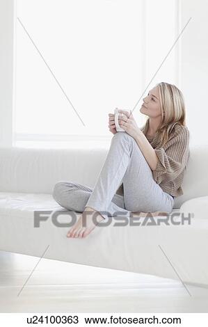 Teenage girl having cup of coffee View Large Photo Image Stock Image - Teenage girl having cup of coffee . Fotosearch