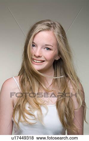 Stock Photo - Teenage girl smiling. Fotosearch