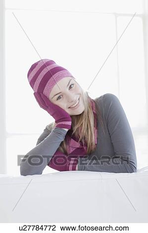 Teenage girl wearing hat and gloves View Large Photo Image Stock Image - Teenage girl wearing hat and gloves. Fotosearch