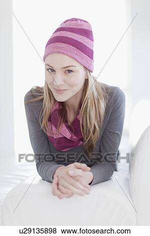 Stock Photo - Teenage girl wearing hat and scarf. Fotosearch