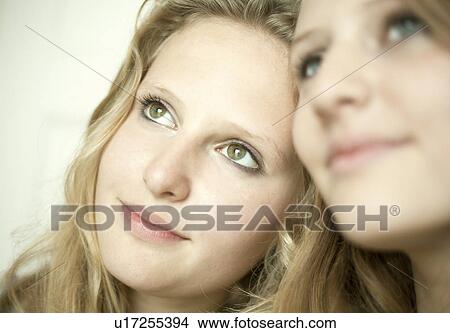 Teenage girls smiling together View Large Photo Image Picture - Teenage girls smiling together. Fotosearch