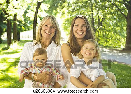 Picture - Three generations of women smiling. Fotosearch