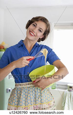 Woman baking in kitchen View Large Photo Image Stock Image - Woman baking in kitchen. Fotosearch