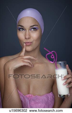 Woman drinking with curly straw View Large Photo Image Stock Image - Woman drinking with curly straw. Fotosearch