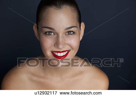 Woman holding halved pomegranate View Large Photo Image Stock Photo - Woman holding halved pomegranate. Fotosearch