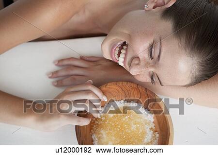 Woman playing with bowl of sugar View Large Photo Image Stock Image - Woman playing with bowl of sugar. Fotosearch