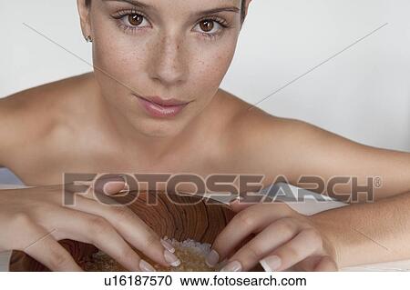 Woman touching bowl of sugar View Large Photo Image Stock Image - Woman touching bowl of sugar. Fotosearch
