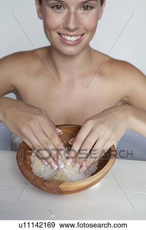 Woman touching bowl of sugar View Large Photo Image Stock Photo - Woman touching bowl of sugar. Fotosearch
