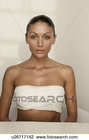 Stock Image - Woman wrapped in towel. Fotosearch