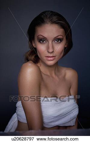 Woman wrapped in towel View Large Photo Image Stock Photo - Woman wrapped in towel. Fotosearch