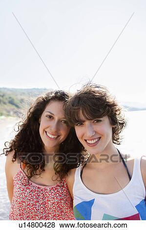 Women smiling together outdoors View Large Photo Image Stock Photo - Women smiling together outdoors. Fotosearch
