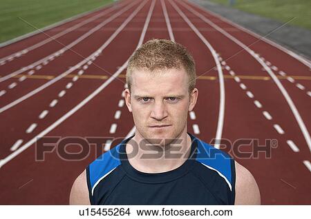 Athlete standing on track View Large Photo Image Picture - Athlete standing on track. Fotosearch