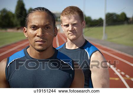 Athletes standing on track View Large Photo Image Picture - Athletes standing on track. Fotosearch