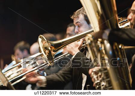 Stock Photo - Brass section in orchestra. Fotosearch