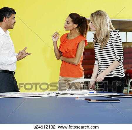 Business people talking in office View Large Photo Image Stock Image - Business people talking in office. Fotosearch