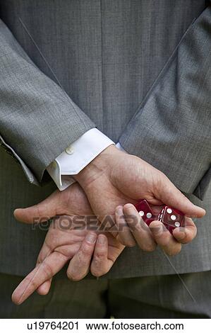 Businessman crossing his fingers View Large Photo Image Stock Image - Businessman crossing his fingers. Fotosearch