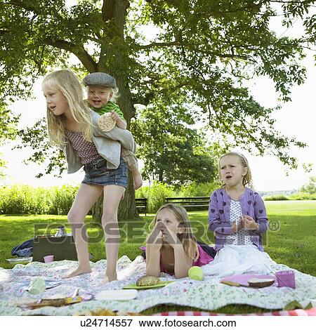 Children playing at picnic View Large Photo Image Stock Photo - Children playing at picnic. Fotosearch