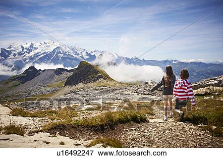 Children walking in rocky landscape View Large Photo Image Stock Photo - Children walking in rocky landscape. Fotosearch