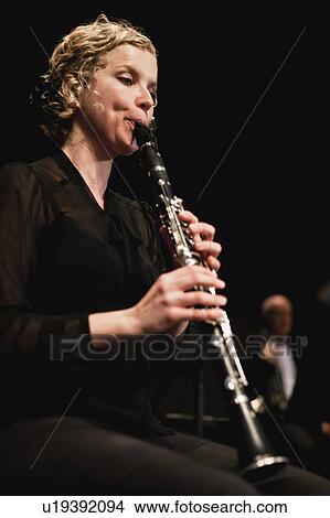 Picture - Clarinet player in orchestra. Fotosearch