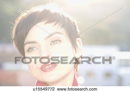 Stock Image - Close up of woman's face. Fotosearch