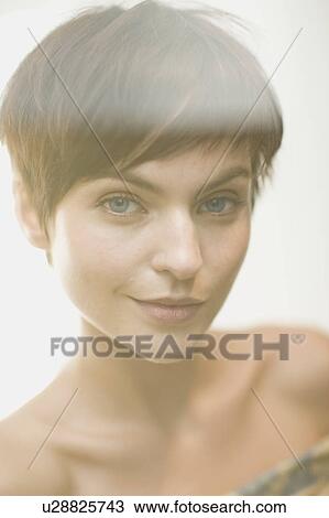 Close up of woman's smiling face View Large Photo Image Stock Image - Close up of woman's smiling face. Fotosearch