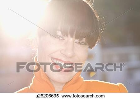 Stock Photography - Close up of woman's smiling face. Fotosearch