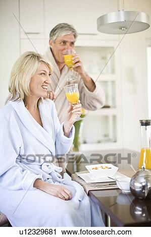 Couple having breakfast together View Large Photo Image Stock Image - Couple having breakfast together. Fotosearch