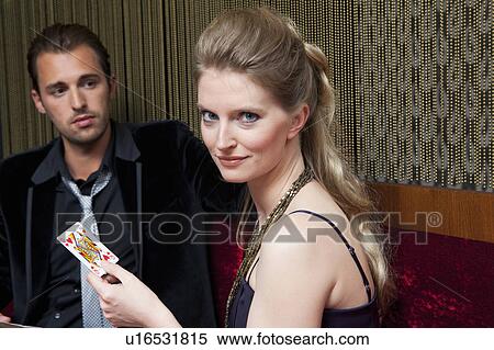 Couple playing cards in bar View Large Photo Image Stock Photography - Couple playing cards in bar. Fotosearch